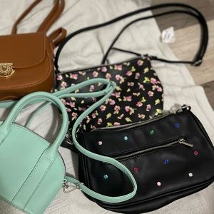 Black purse with polkadots.